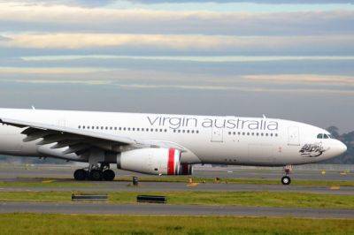 Virgin Australia Rides Soaring Travel Demand to First Profit in 11 Years - skift.com - Australia - city Bain