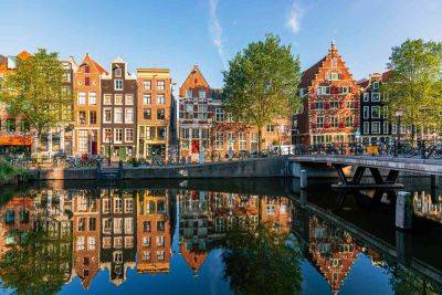 Amsterdam to Implement Largest Tourist Tax in Europe — What to Know - travelandleisure.com - city Amsterdam - Iceland - Eu - city Honolulu - county Van Buren - Hawaiian