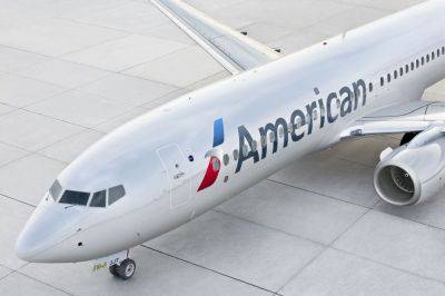 American Airlines Eyes Delta and United Customers With New Status Match Offer - travelandleisure.com - Usa - state Alaska - county Delta