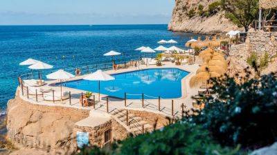 Four Stunning Mallorca Beach Clubs To Visit This Summer—Including New Mar From St. Regis Mardavall - forbes.com