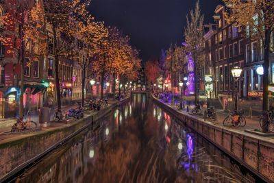 Amsterdam Looks to Dim Red Light District Tourism - skift.com - Netherlands - city Amsterdam - city Major