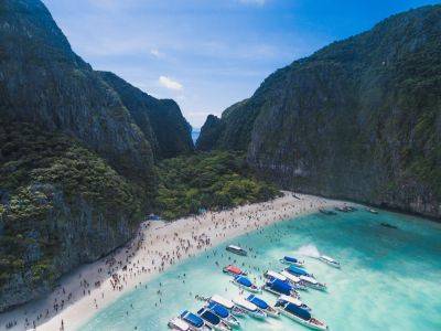 Thailand's Maya Bay Sees Sharks and Tourists Fight for Space - skift.com - Thailand