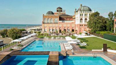 This Glam 1908 Lido Resort Is Synonymous With The Venice Film Festival - forbes.com