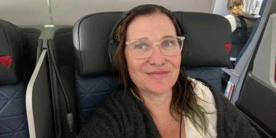 My husband and I routinely fly first class and leave our kids in coach. It doesn't make us bad parents. - insider.com