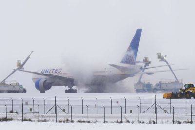 Thousands of Flights Canceled As Widespread Winter Weather Sweeps U.S. — What to Know - travelandleisure.com - Usa - New York - city New York - Washington - state Texas - city Chicago - Denver - state Iowa - city Houston