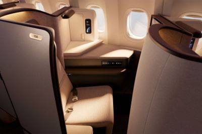 Cathay Pacific's Revamped Business Class Offers the Airline's First-ever Closing Doors, Impressive Tech, and Local Artwork — Take a Look - travelandleisure.com - Usa - Hong Kong - city Hong Kong