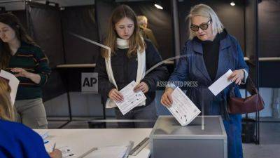 Lithuania votes in the 2nd round of its parliamentary election, with change uncertain - euronews.com - Eu - Lithuania - Russia - Ukraine - city Moscow - region Baltic - Belarus