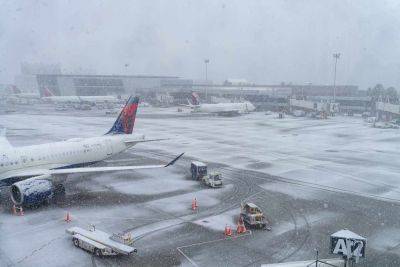 More Than a Thousand Flights Canceled, Hundreds Delayed Amid Northeast Snowstorm — What Travelers Need to Know - travelandleisure.com - Usa - New York - city New York - Washington - city Boston, county Logan - county Logan - Baltimore - state Washington - state New York - county Reagan