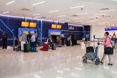 JetBlue Quietly Increased Its Baggage Fees This Month — What to Know - travelandleisure.com - Usa - state Alaska