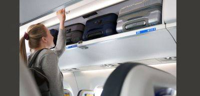 United becomes first airline to add new, larger overhead bins to Embraer E175 aircraft - traveldailynews.com - city Chicago