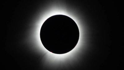 In Photos: Total Solar Eclipse Dazzles Skywatchers Across North America - forbes.com - Usa - state Missouri - state Tennessee - Mexico - Canada - state Vermont - state California - state Michigan - state Florida - state Maine - state Oklahoma - state Pennsylvania - state Texas - state Alaska - state Massachusets - state New Hampshire - state Arkansas - state Ohio - state New York - state Indiana - state Montana - state South Dakota - state Kentucky - state Illinois - Salem, state Massachusets - city Carbondale, state Illinois - county Cape Girardeau