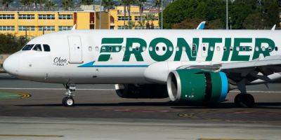 A Frontier passenger sat in an exit row was escorted off the plane in handcuffs after seemingly saying she wouldn't help in an emergency - insider.com - Mexico