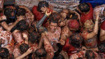 Spain’s La Tomatina 2024: the fullest guide to the messiest festival - lonelyplanet.com - Spain