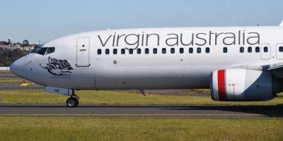 A passenger with 'no clothes on' ran through a plane mid-journey, causing chaos and knocking over a flight attendant - insider.com - Australia