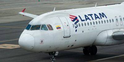 A passenger who turned up too late for his flight started kicking the plane door before being arrested, report says - insider.com - Usa - Colombia - county El Dorado