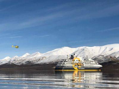 Quark Expeditions Adds Helicopter Flights Over Remote Axel Heiberg Island in the Canadian Arctic - travelpulse.com - Canada - county Island - county Canadian